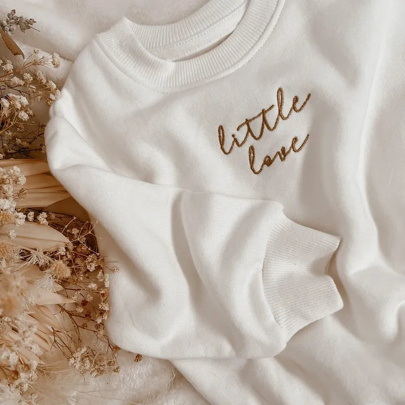 Romper with embroidered letters for newborn